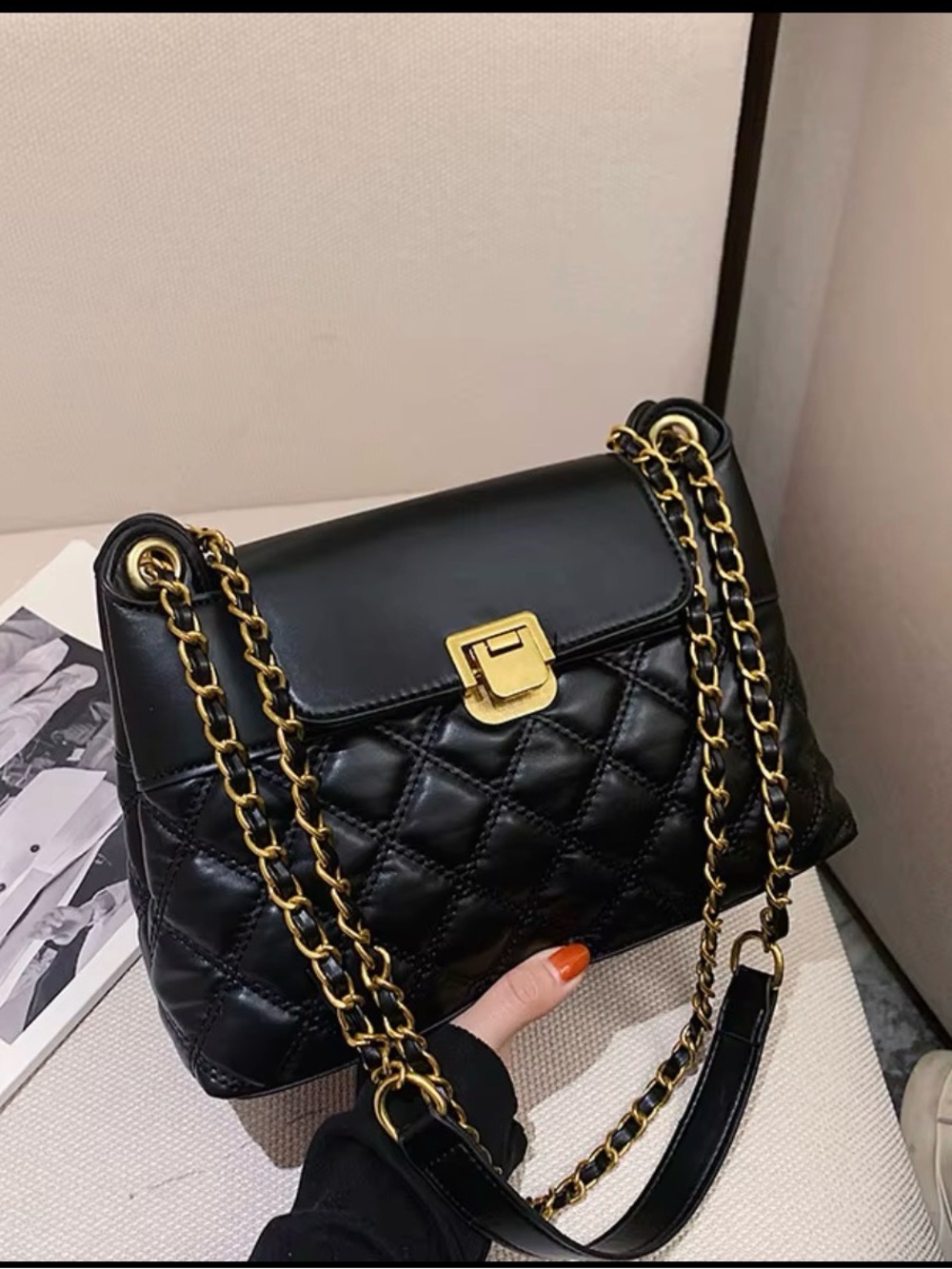 Elegant Black Quilted Shoulder Bag with Gold Chain Strap